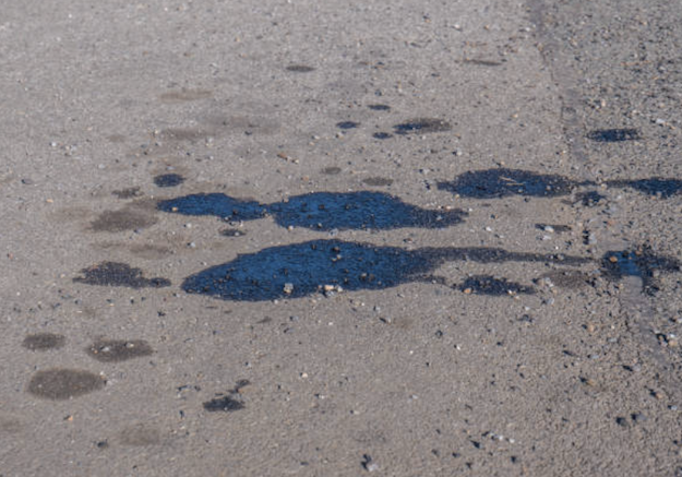 how to get rid of black oil stains on driveway